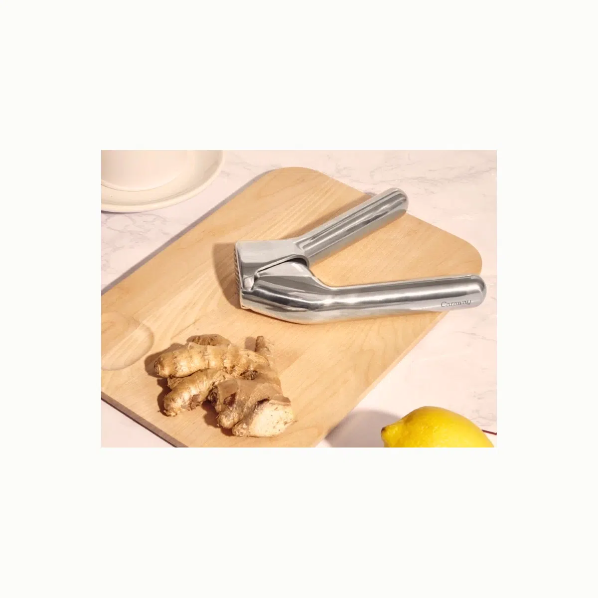 caraway-stainless-steel-garlic-press-non-toxic-ergonomic-garlic-crusher-mincer-e image 4